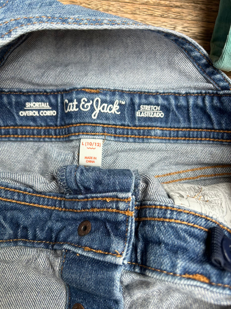 Close-up of Cat & Jack denim jeans with label and stitching details.