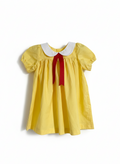 Yellow dress with a white collar and red ribbon on a white background