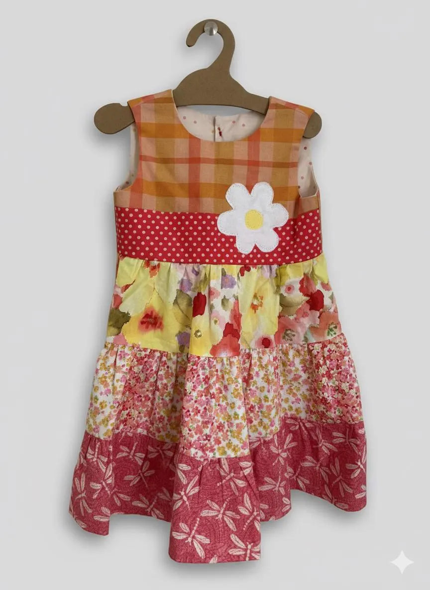 patchwork dress on hanger