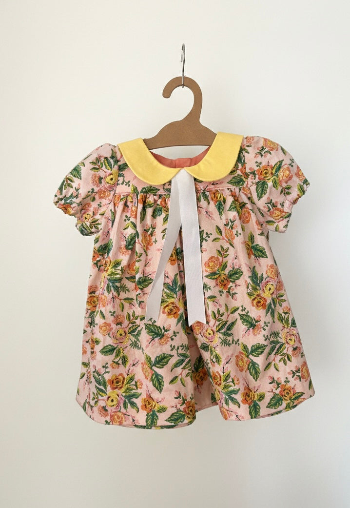 Pink Floral dress with yellow peter pan collar softly swaying