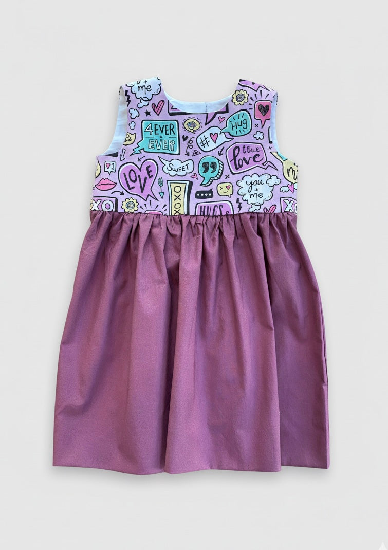 Purple dress with colorful patterned top on a white background