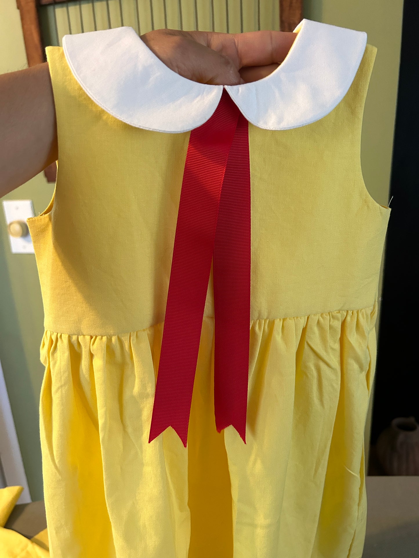 Little Yellow Dress with Red Ribbon