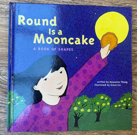 Round is a Mooncake - A Book of Shapes