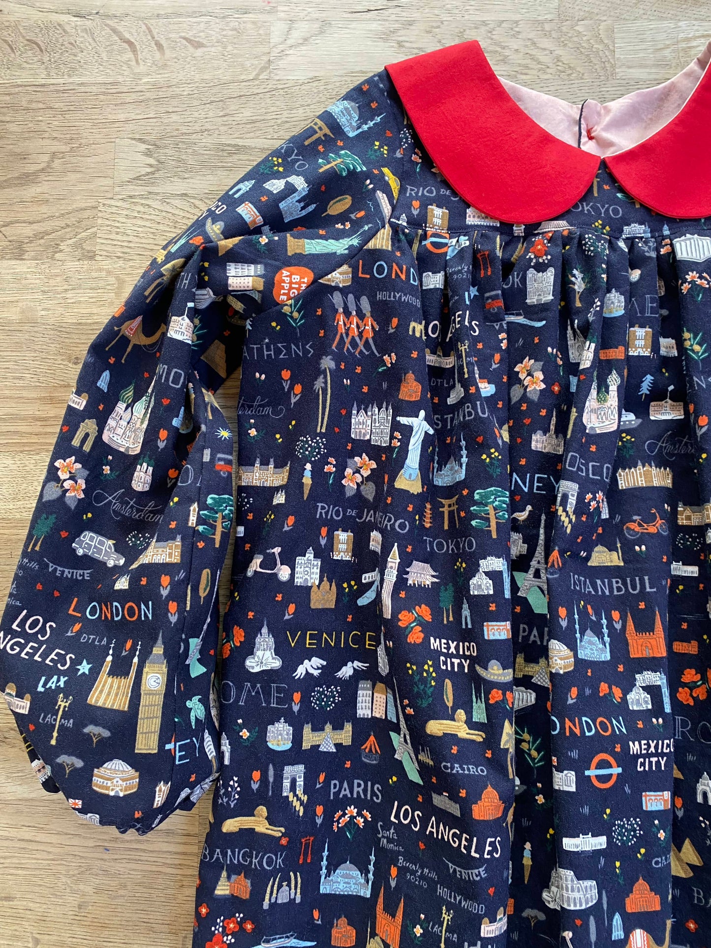 Little World Traveler Dress with Red Peter Pan Collar (MADE TO ORDER)