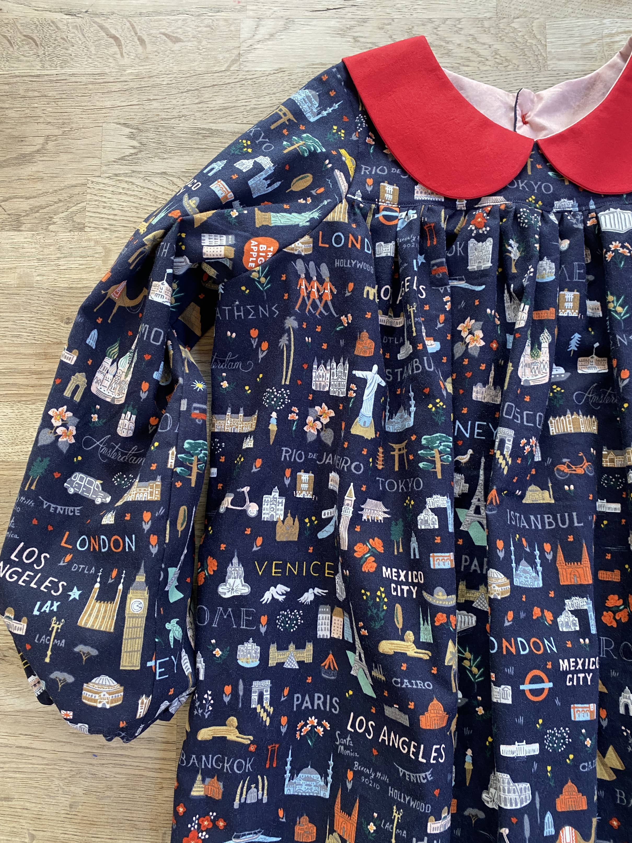 Little World Traveler Dress with Red Peter Pan Collar (MADE TO ORDER)